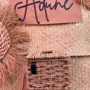 Raffia-wrapped tissue and storage box with Aduné leather tag