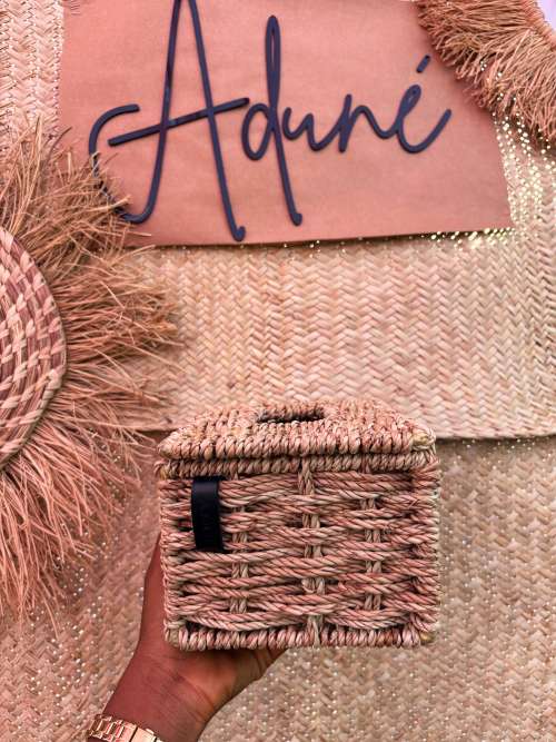 Raffia-wrapped tissue and storage box with Aduné leather tag