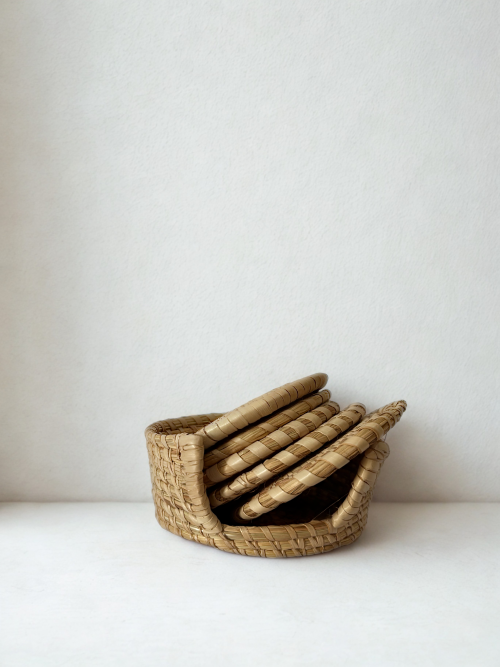 coasters, handwoven, Aduné Home, table décor, natural texture, bamboo style, eco-luxury, sustainable living, woven basket,handmade tableware, sustainable coasters